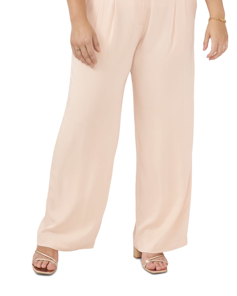 Front of a model wearing a size 14W Delphi Font Pleat Pant in SPANISH VILLA by 1.State. | dia_product_style_image_id:262084